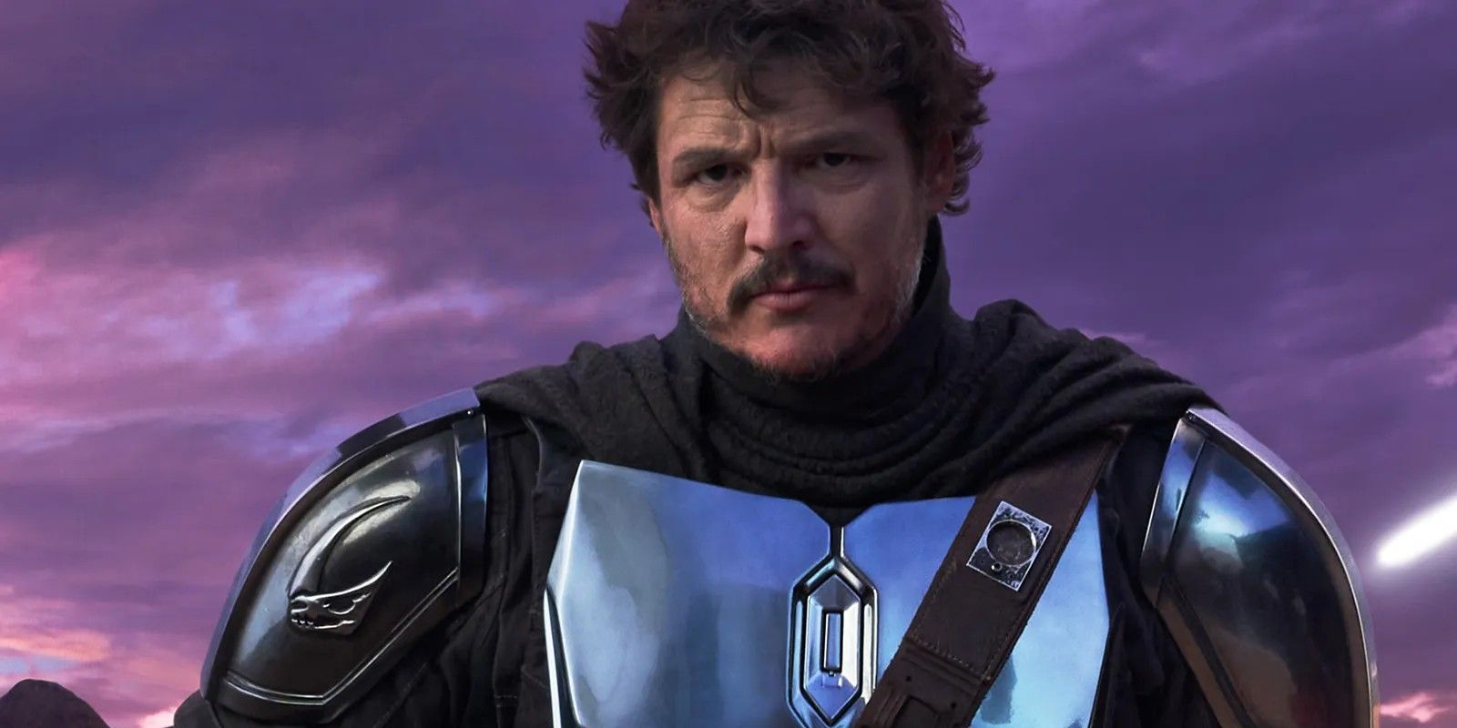 An unhelmeted Pedro Pascal's Din Djarin prepares for battle in The Mandalorian.