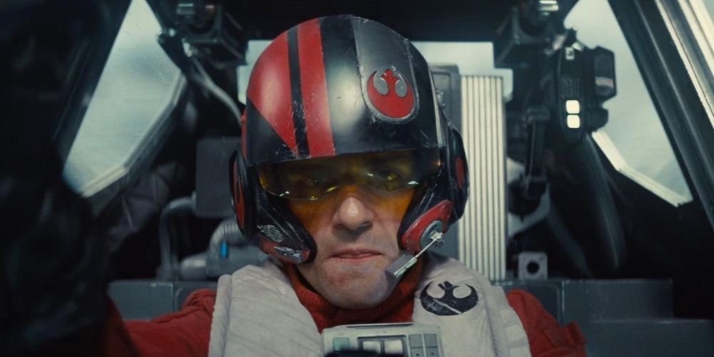 Poe Dameron na cabine de seu X-wing