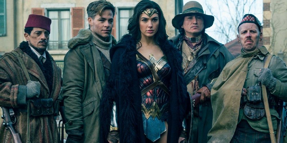Princess Diana and her friends take a photo in Wonder Woman (2017)