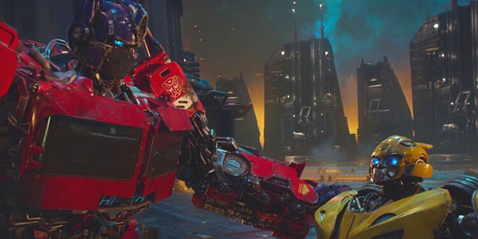 Optimus Prime with his and on Bumblebee's shoulder, Cybertron in the background
