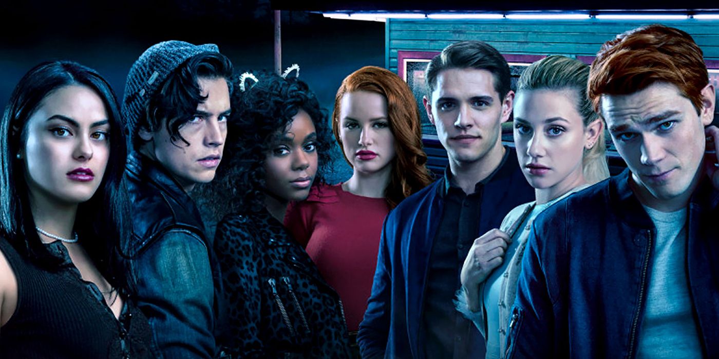 The cast of Riverdale posing, including Veronica, Jughead, Josie, Cheryl, Kevin, Betty, and Archie.