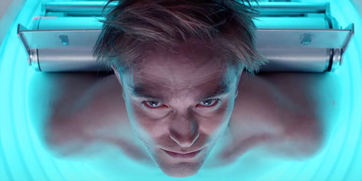 Robert Pattinson looking up from an isolation chamber in the Mickey 17 teaser.