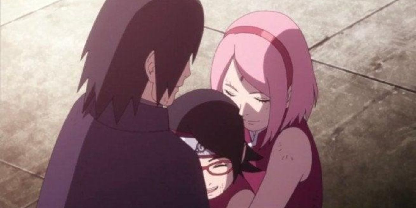 Sasuke, Sakura, and Sarada hug in Boruto.