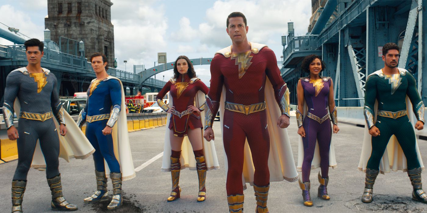 The Shazam Family stand side by side on a bridge in Shazam! Fury of the Gods.