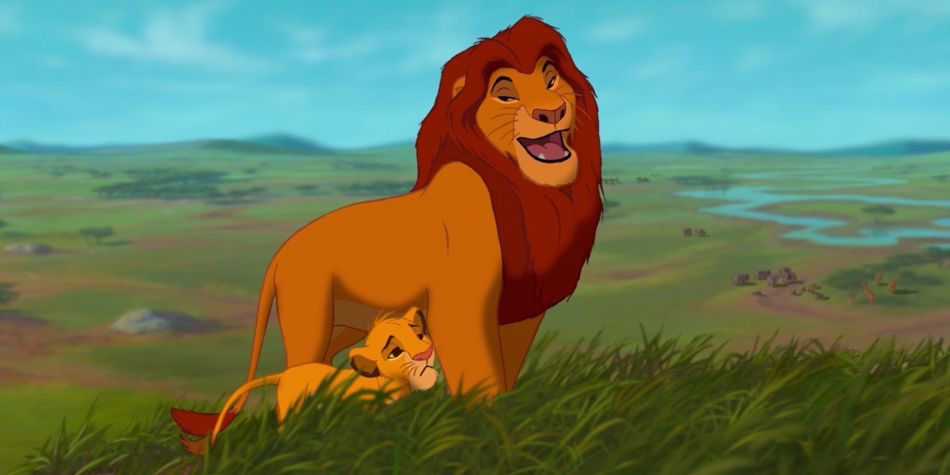 Mufasa and young Simba in a plain of grass in The Lion King 1994.