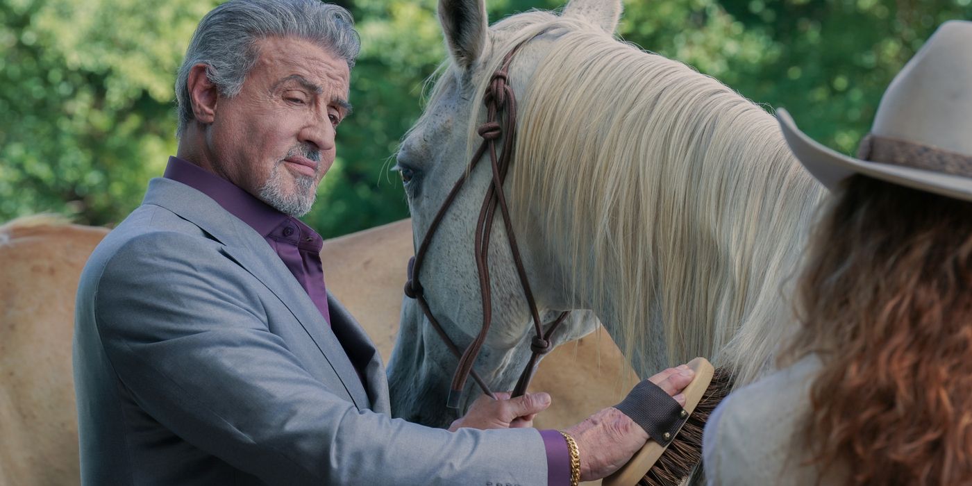 Sylvester Stallone's character pats a horse in Tulsa King