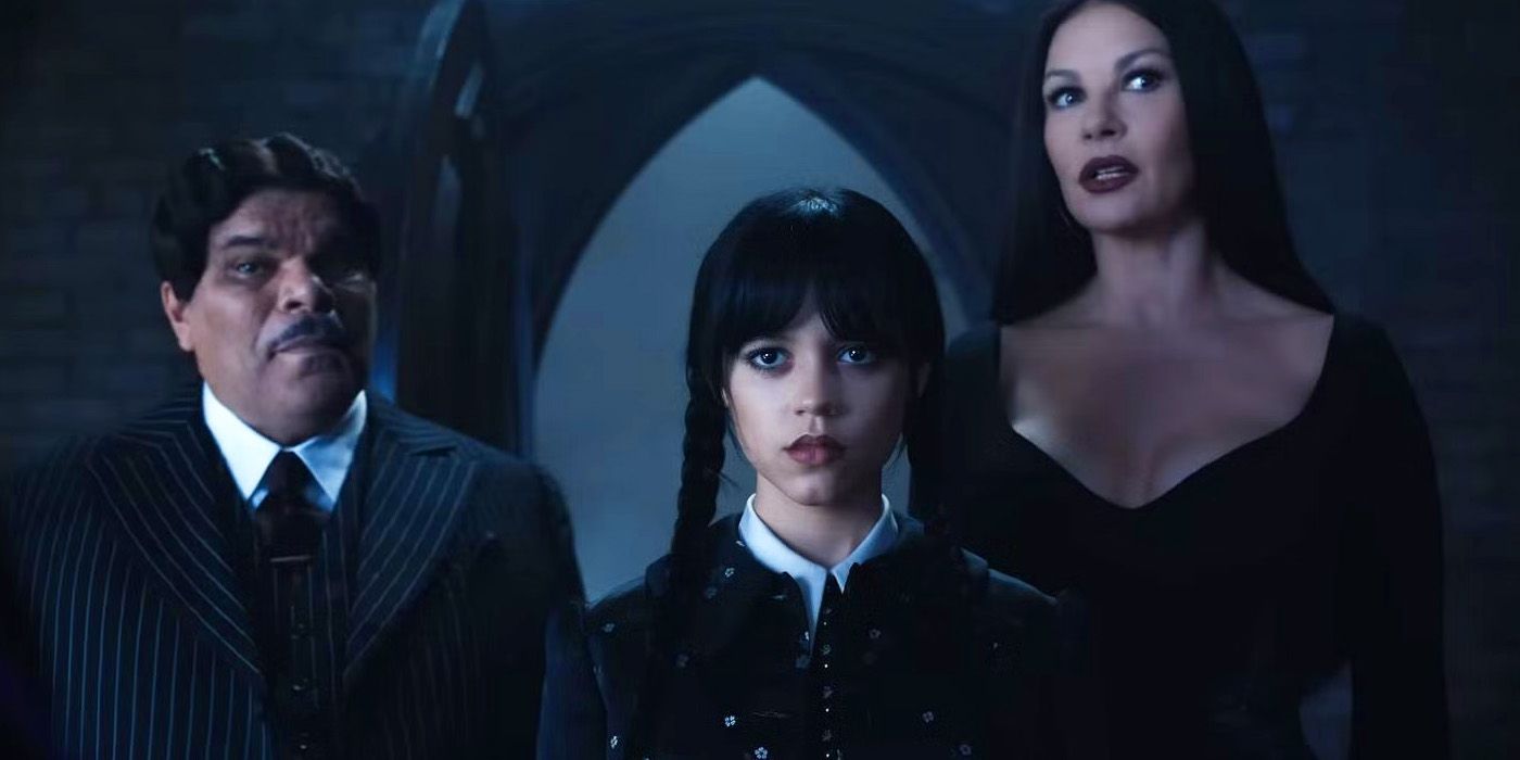 Wednesday Addams flanked by her parents Gomez and Morticia on Netflix's Wednesday.