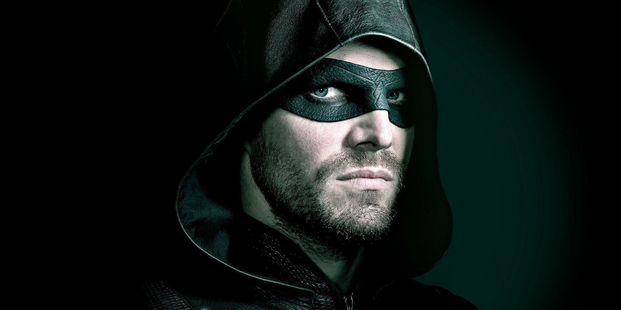 Stephen Amell dons Oliver Queen's signature costume as Green Arrow.