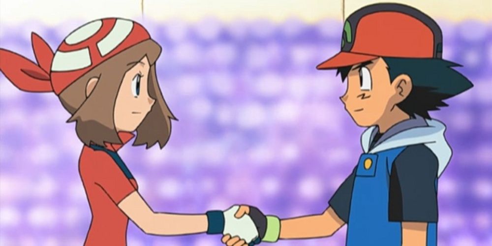 Ash and May shake hands in Pokémon.
