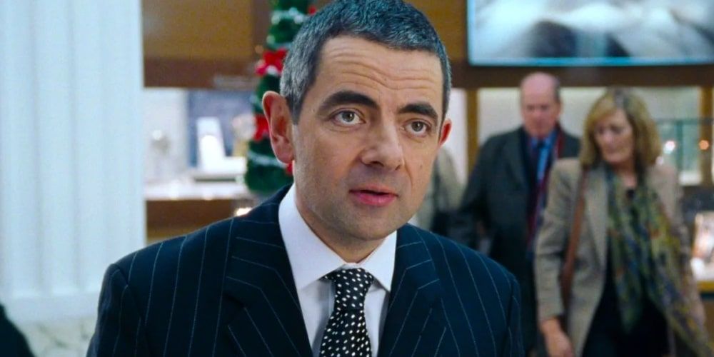 Rowan Atkinson's Love Actually character serves at the jewellery counter