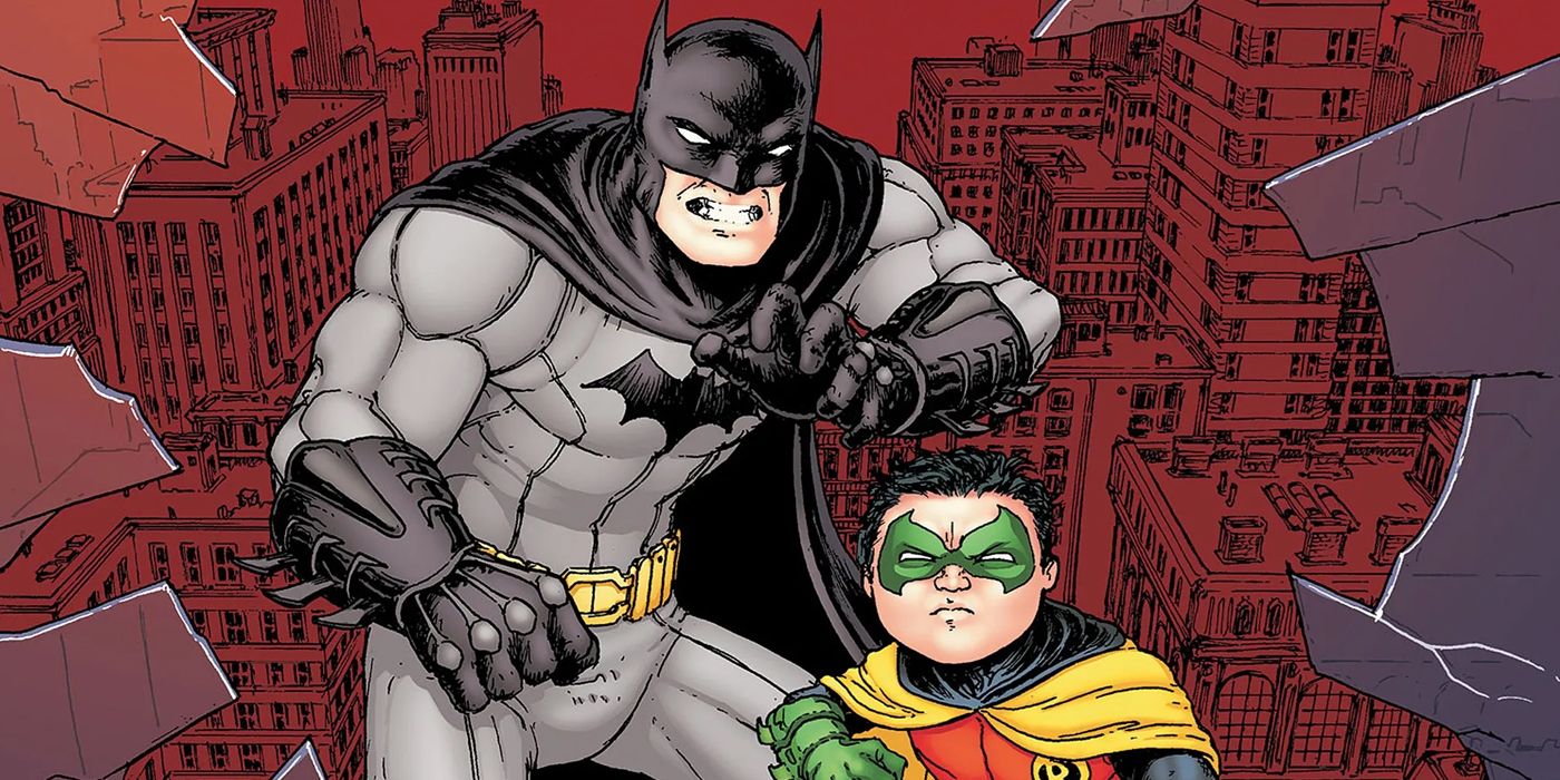 Batman standing ready with his son Damian Wayne as Robin