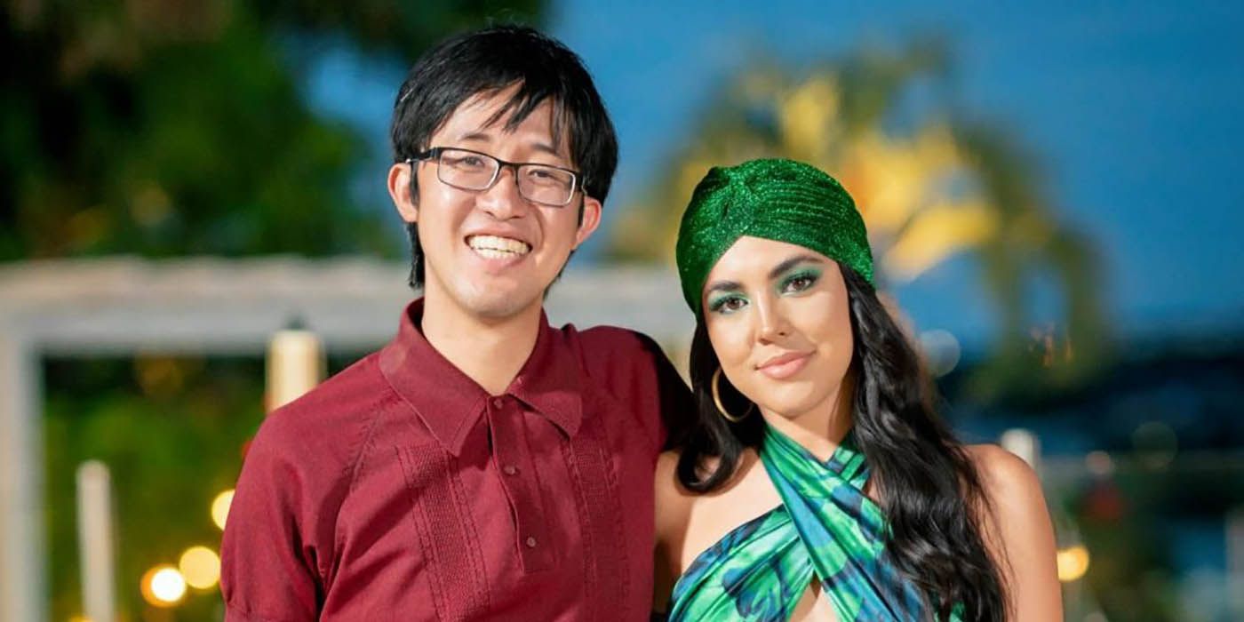 A young man with a button shirt and hglasses and a young woman with a green headband and make-up in a dress from Beauty and the Geek.