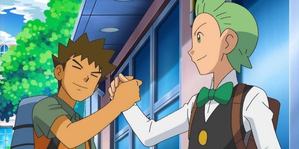 Brock and Cilan grasp hands in Pokémon.