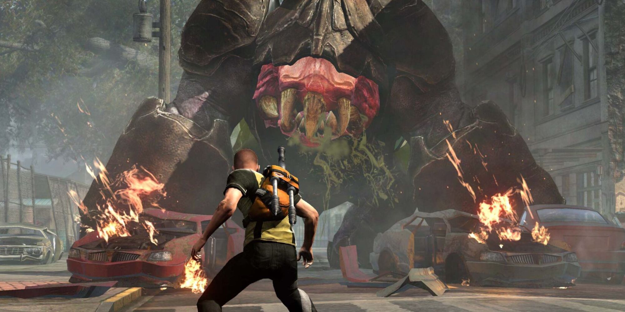Cole fighting a giant monster in Infamous 2