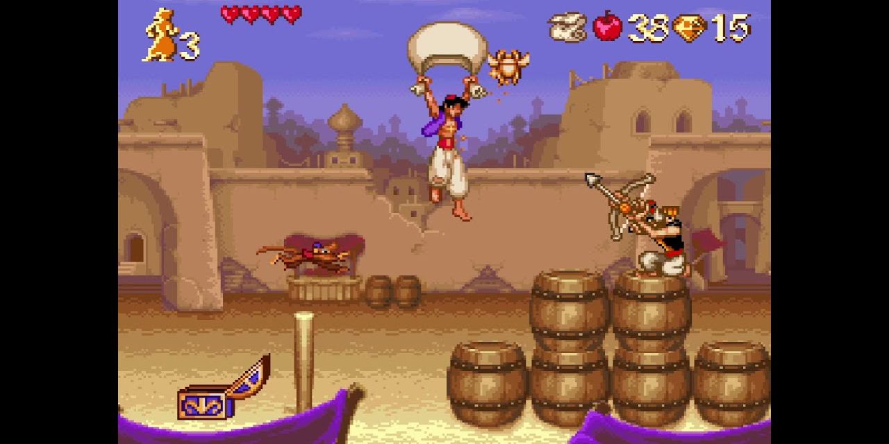 A guard takes aim at Aladdin as he parachutes in Disney's Aladdin for Super Nintendo