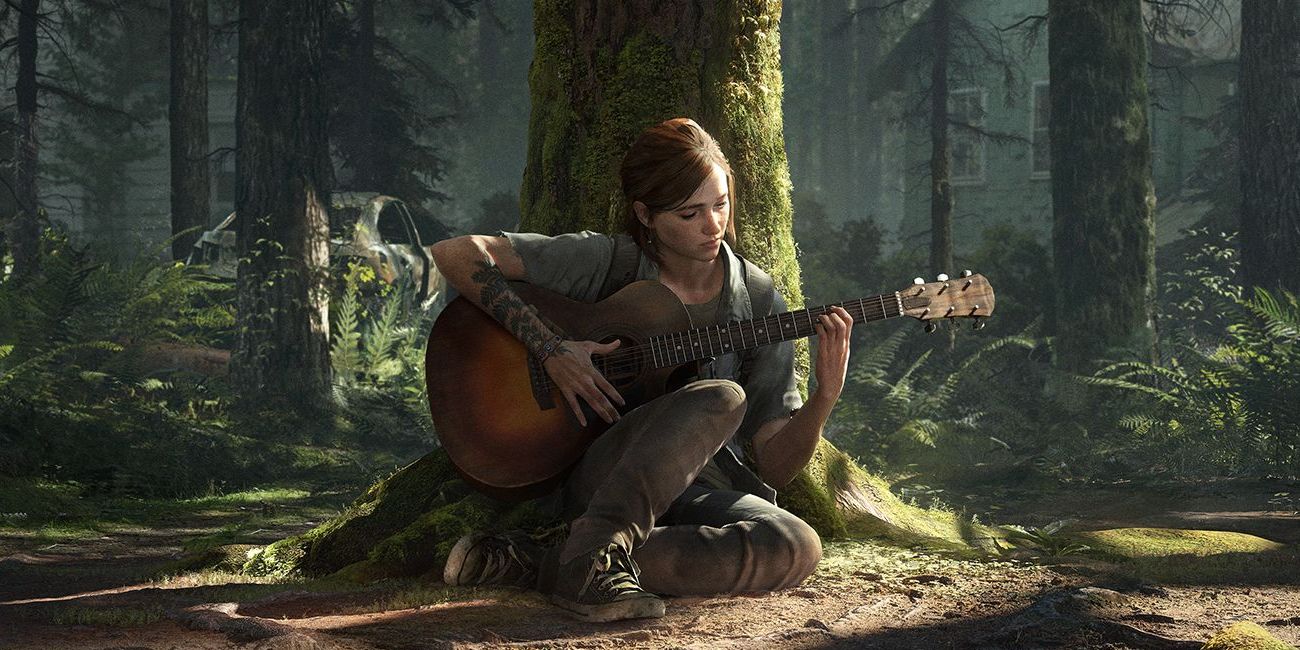 Ellie plays her guitar in a forest in key art for The Last of Us Part II.