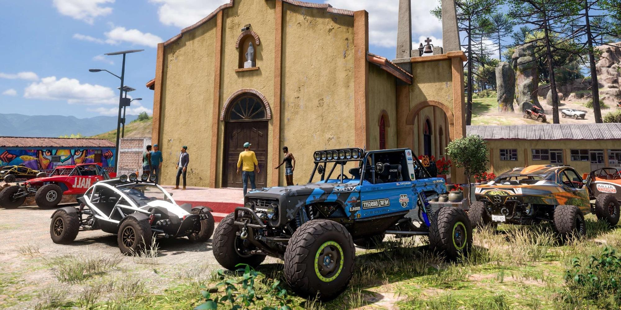 A group of people are hanging out in front of a church with their collection of cars parked out front in Forza Horizon 5