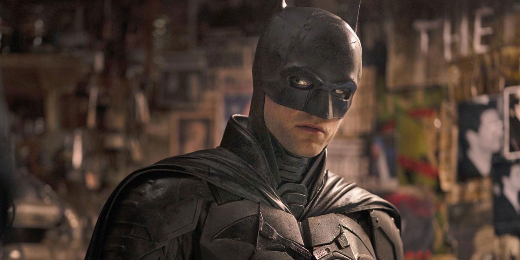 An image of Robert Pattinson as Batman in the Matt Reeves film 