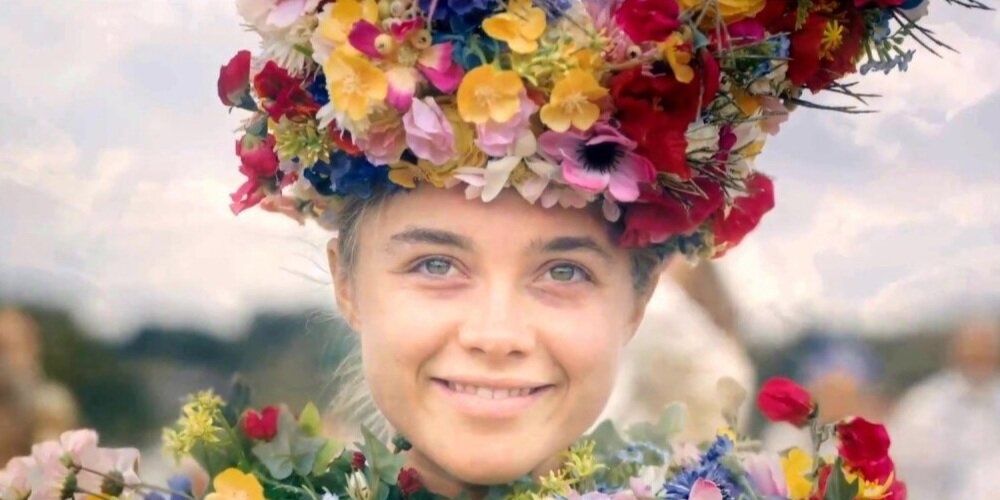 Dani Ardor with the flower costume from Midsommar smiling 