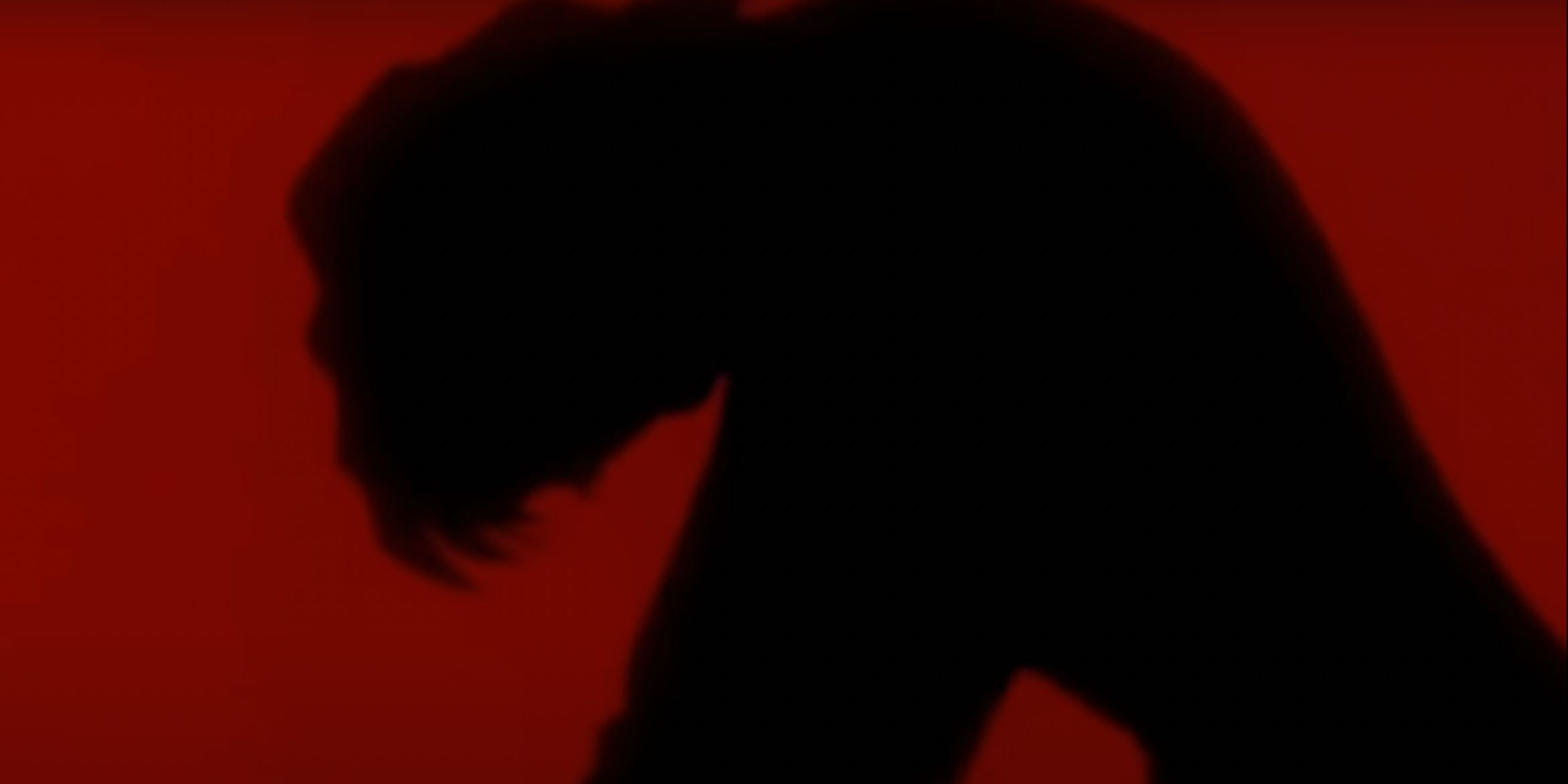 Naoko strangles Rei through silhouette in Neon Genesis Evangelion
