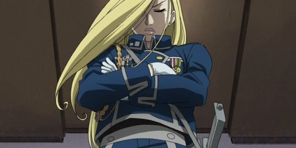 Olivier Armstrong with her arms crossed, with her head down and eyes closed in Fullmetal Alchemist