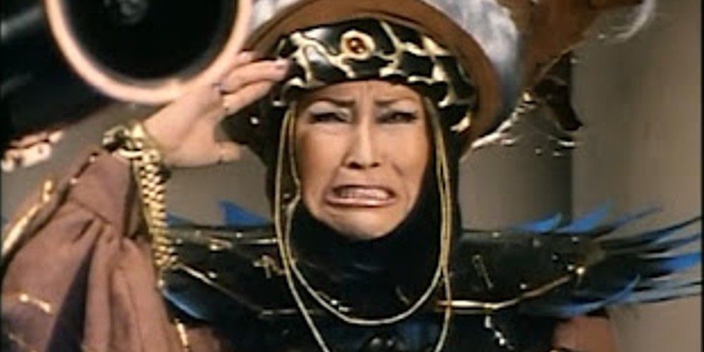 Witch Bandora/Rita Repulsa has a headache in Zyuranger and Power Rangers
