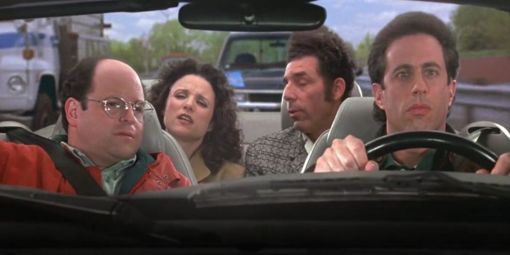 Jerry driving a car with George, Elaine, and Kramer in Seinfeld
