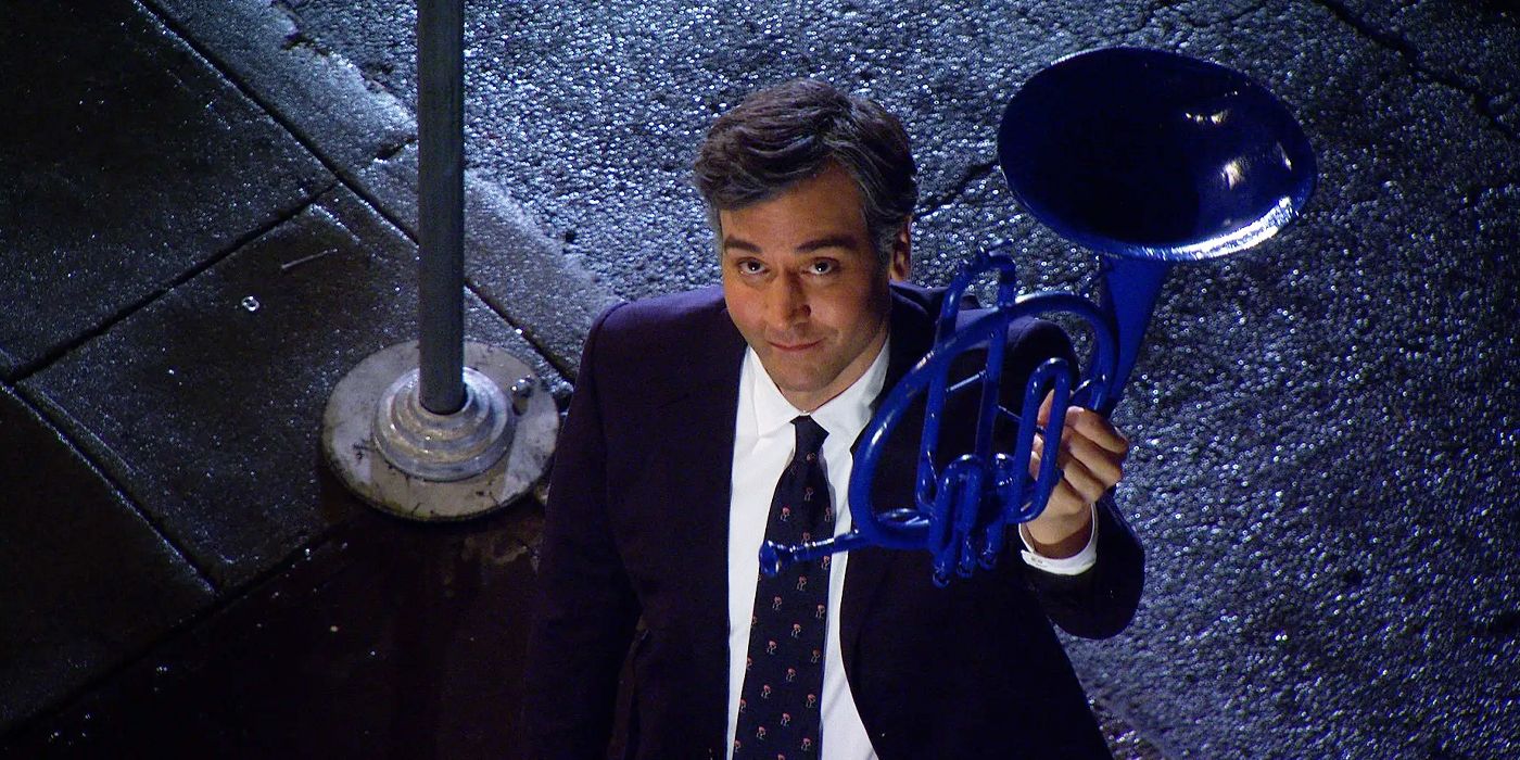 Ted Mosby holds up the blue French horn in the How I Met Your Mother series finale.