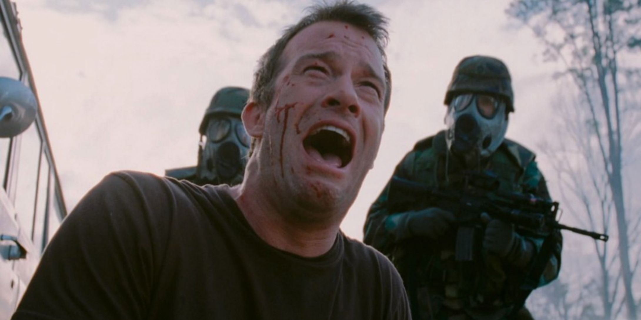 Thomas Jane cries over his fallen son at the end of The Mist