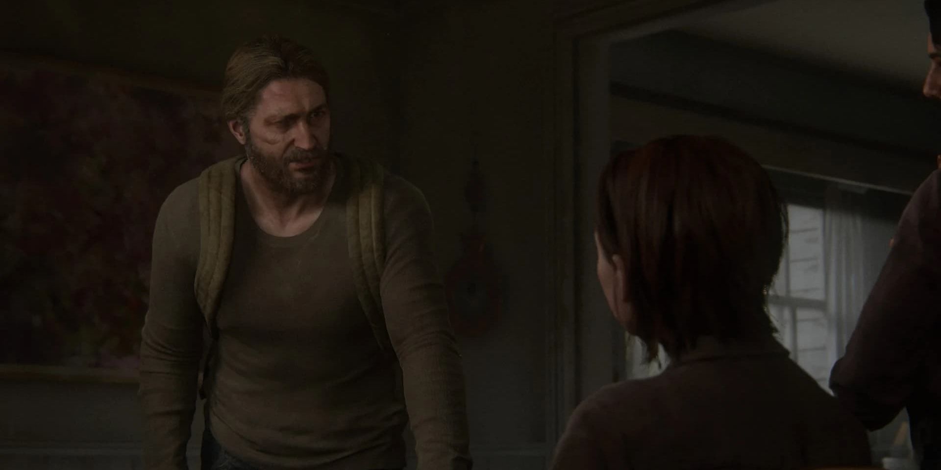 Tommy talking to Ellie in The Last of Us 2 