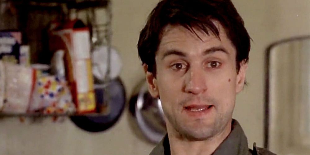 Travis Bickle practices being a tough guy in Taxi Driver