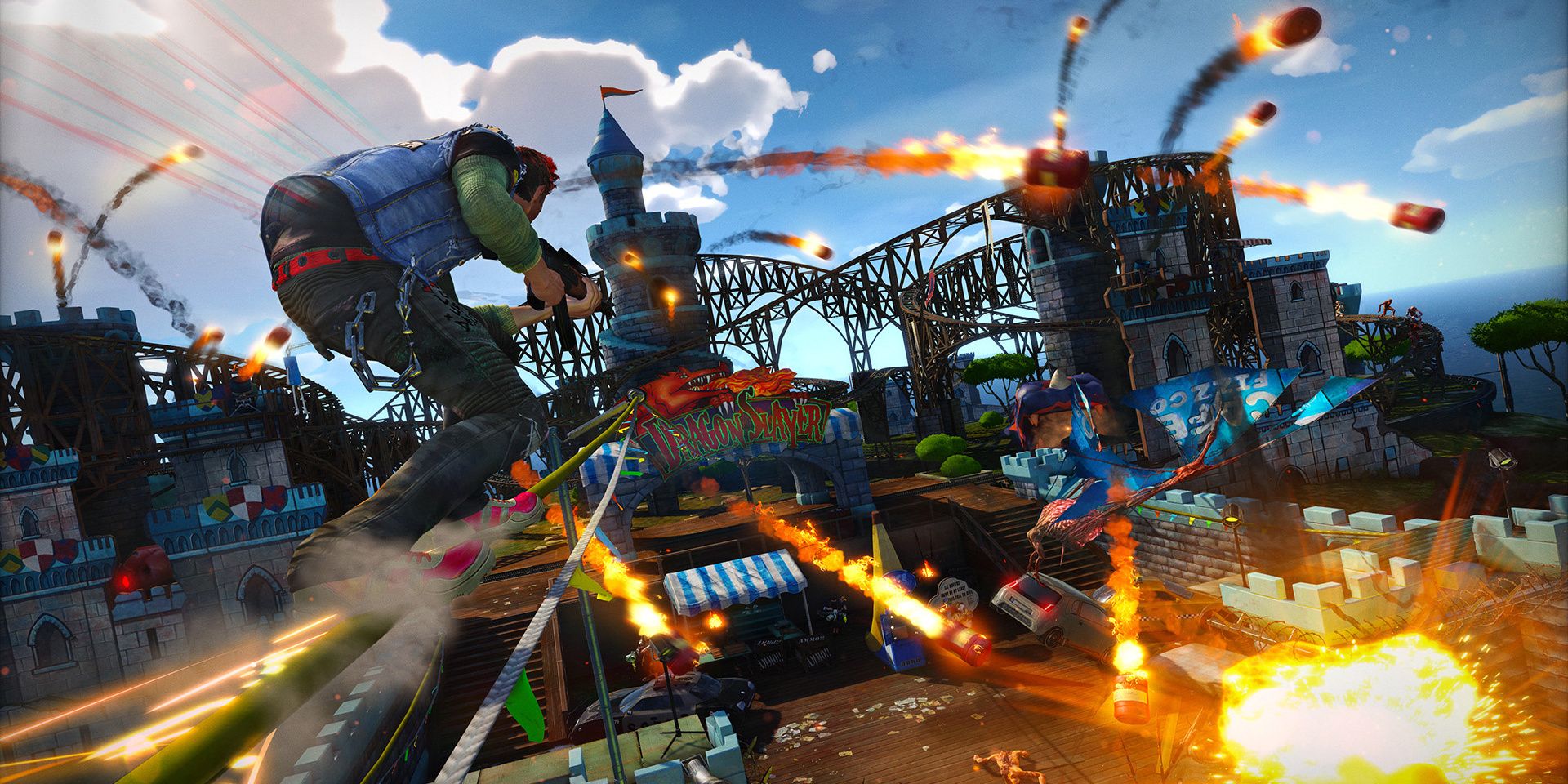 Player grinds on a rail with rockets flying and explosions everywhere at the Amusement Park in Sunset Overdrive