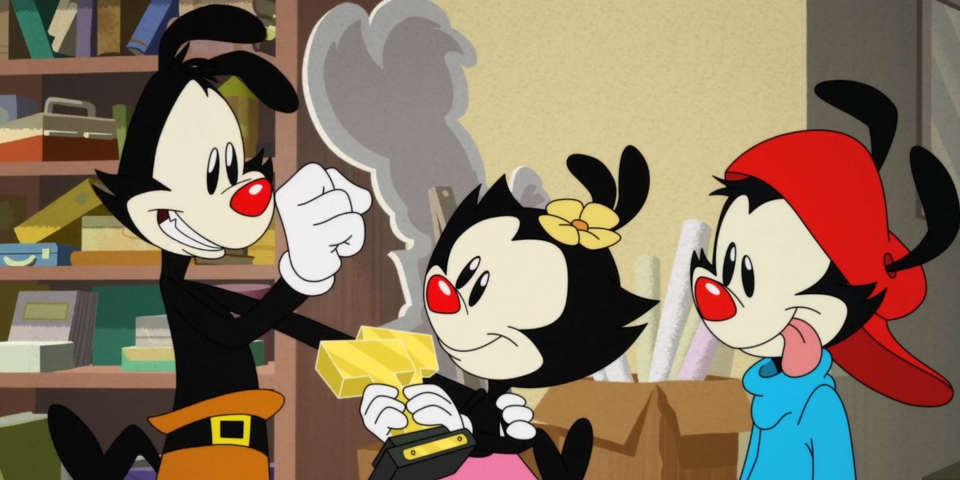 Yakko, Wakko e Dot sorrindo e se olhando em Animaniacs.