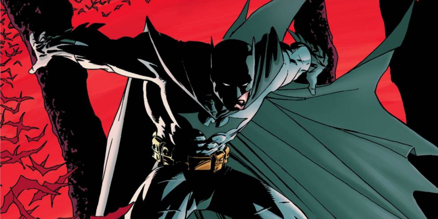 Batman striking an action pose in DC Comics, bats behind him.