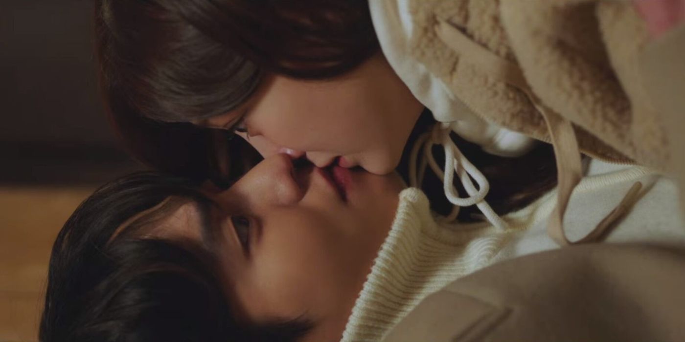 a scene from business proposal where shin ha-ri fell into kang tae-mu's arms and their lips touched.