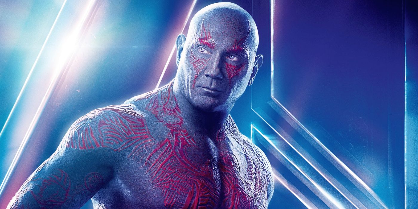 Dave Bautista as Drax in the Marvel Cinematic Universe looking over his shoulder.