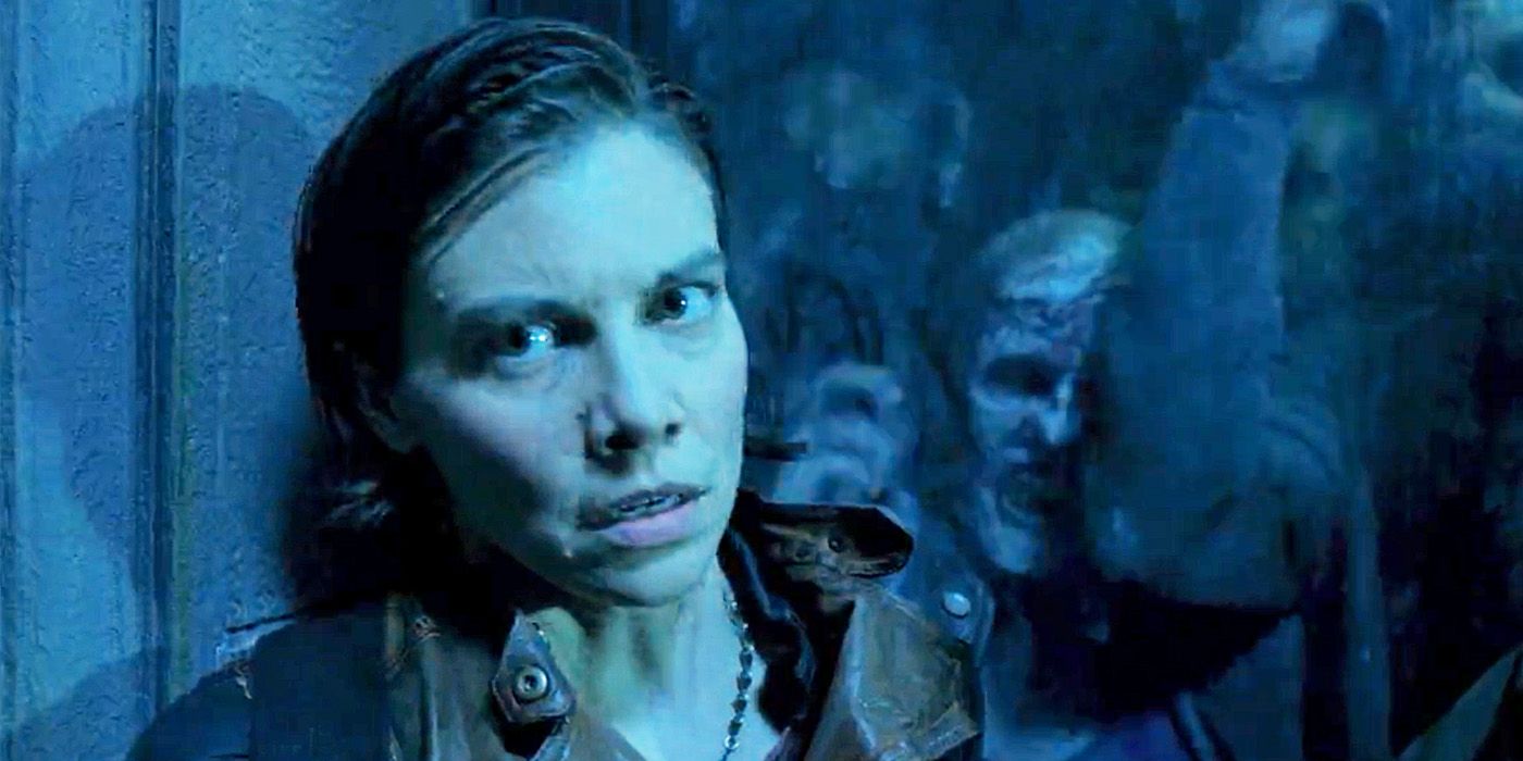 Lauren Cohan's Maggie stands in front of walkers trapped behind glass on The Walking Dead: Dead City