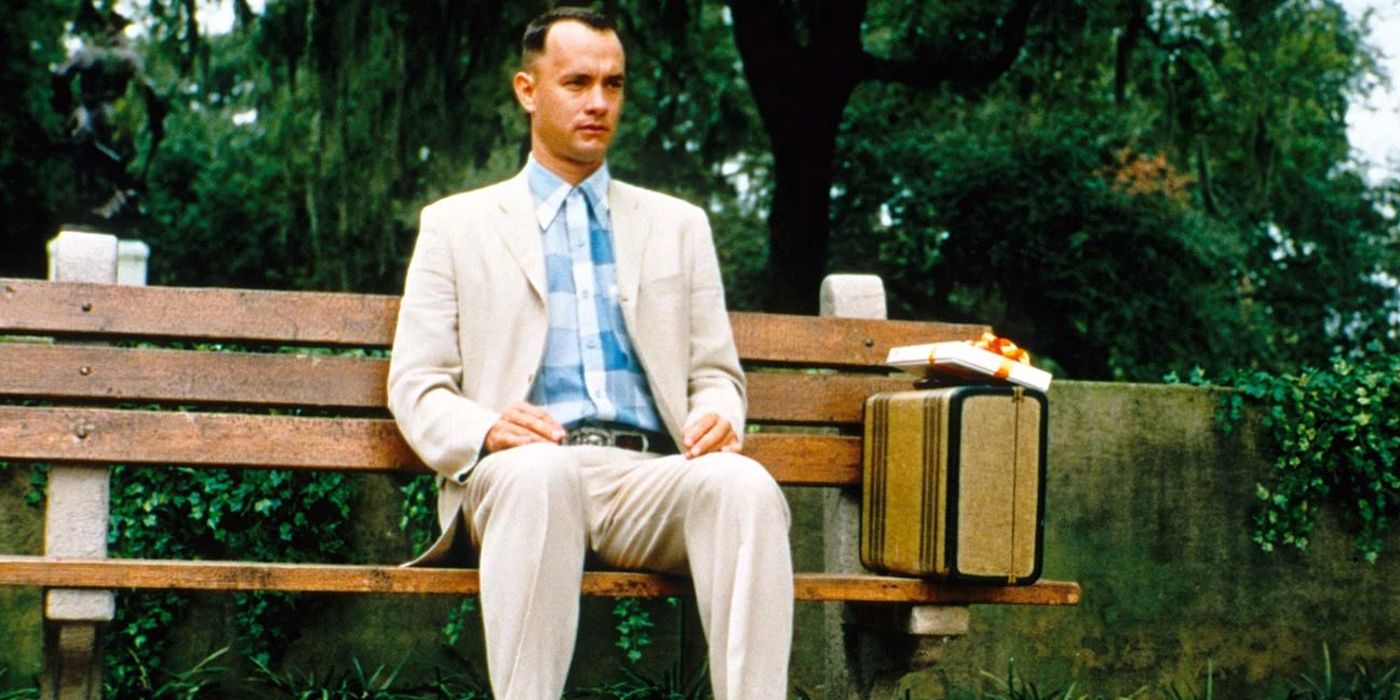 Tom Hanks as Forrest sitting on a bench in Forrest Gump
