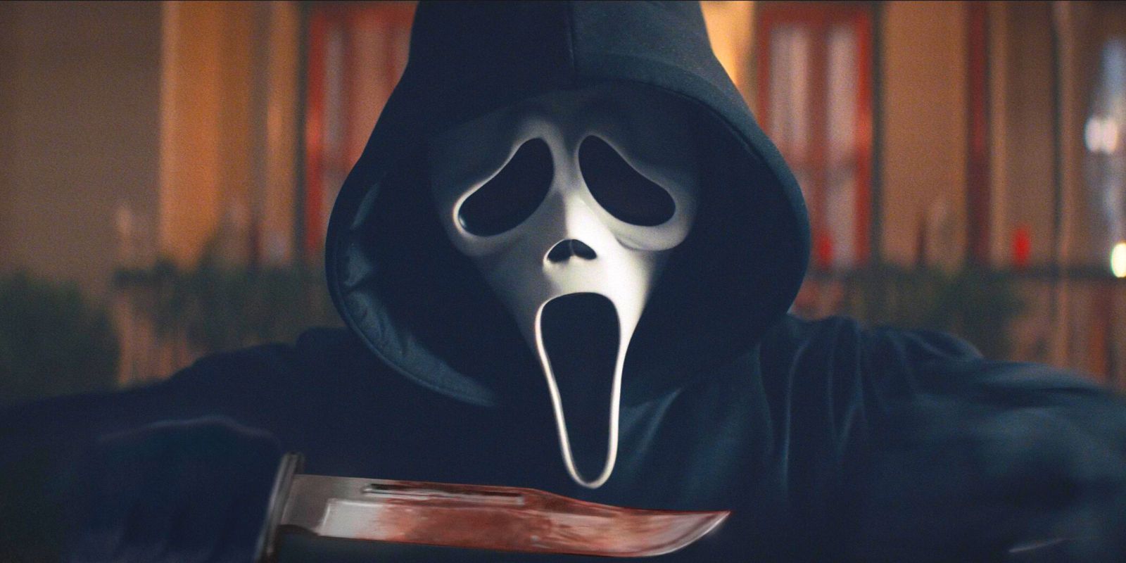 Scream's Ghostface posing with a combat knife