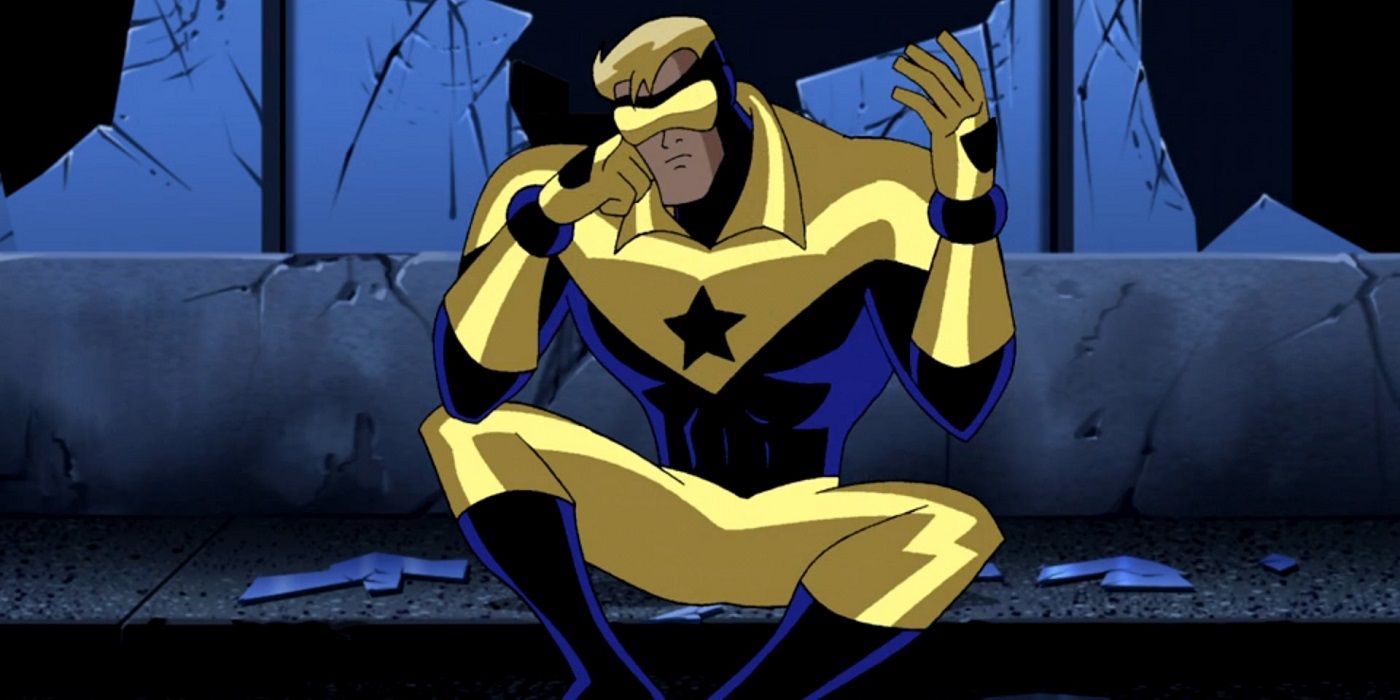 Booster Gold sitting on the sidewalk in Justice League Unlimited.