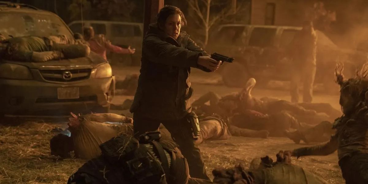 Kathleen aims her gun at Infected in episode five of HBO's The Last of Us