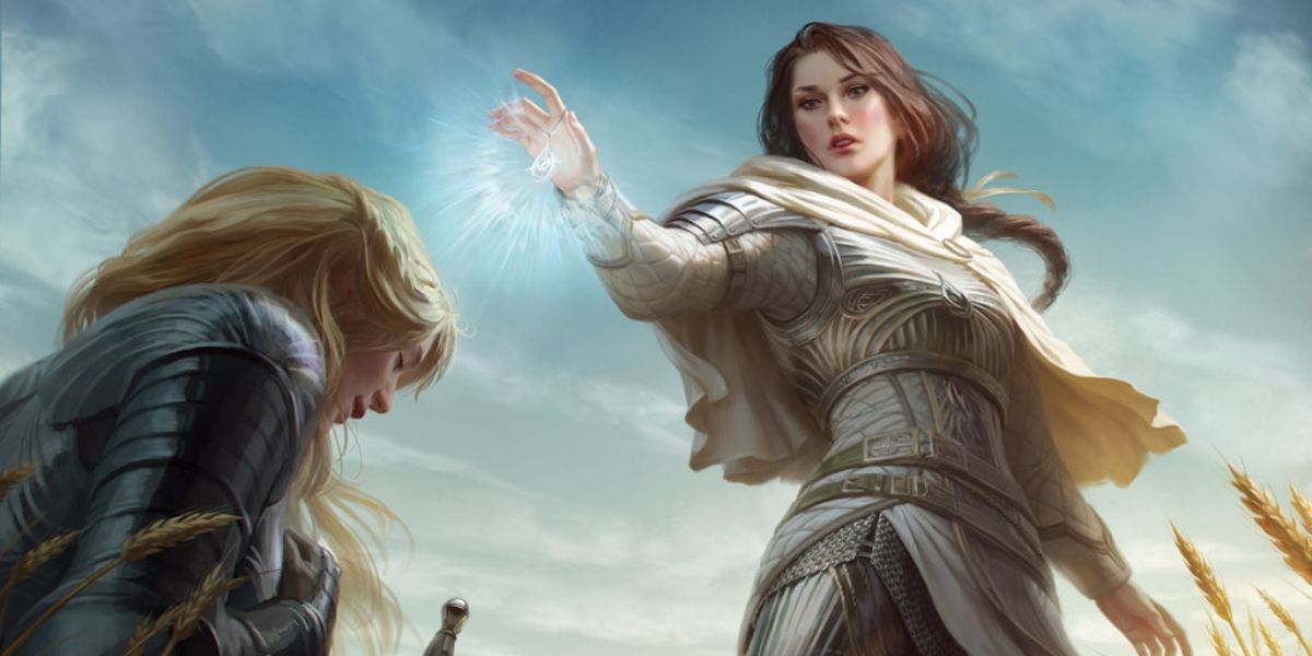 A female cleric blessing a female knight