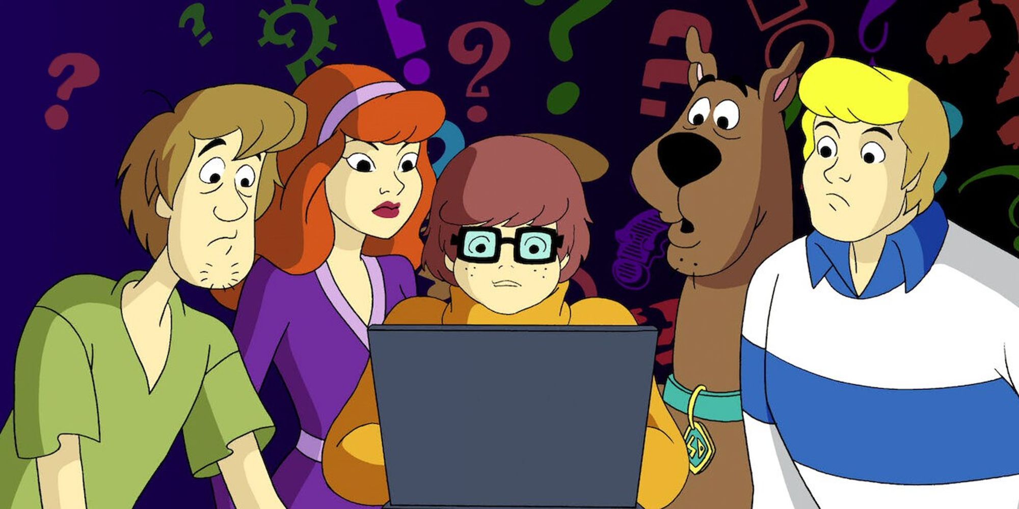 Mystery Inc. at a computer in the intro for What's New Scooby-Doo