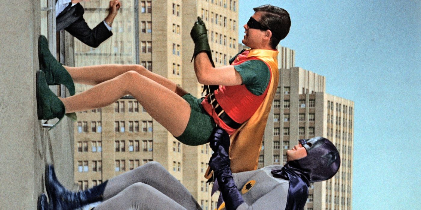 Robin and Batman scaling a building in the 60s TV series