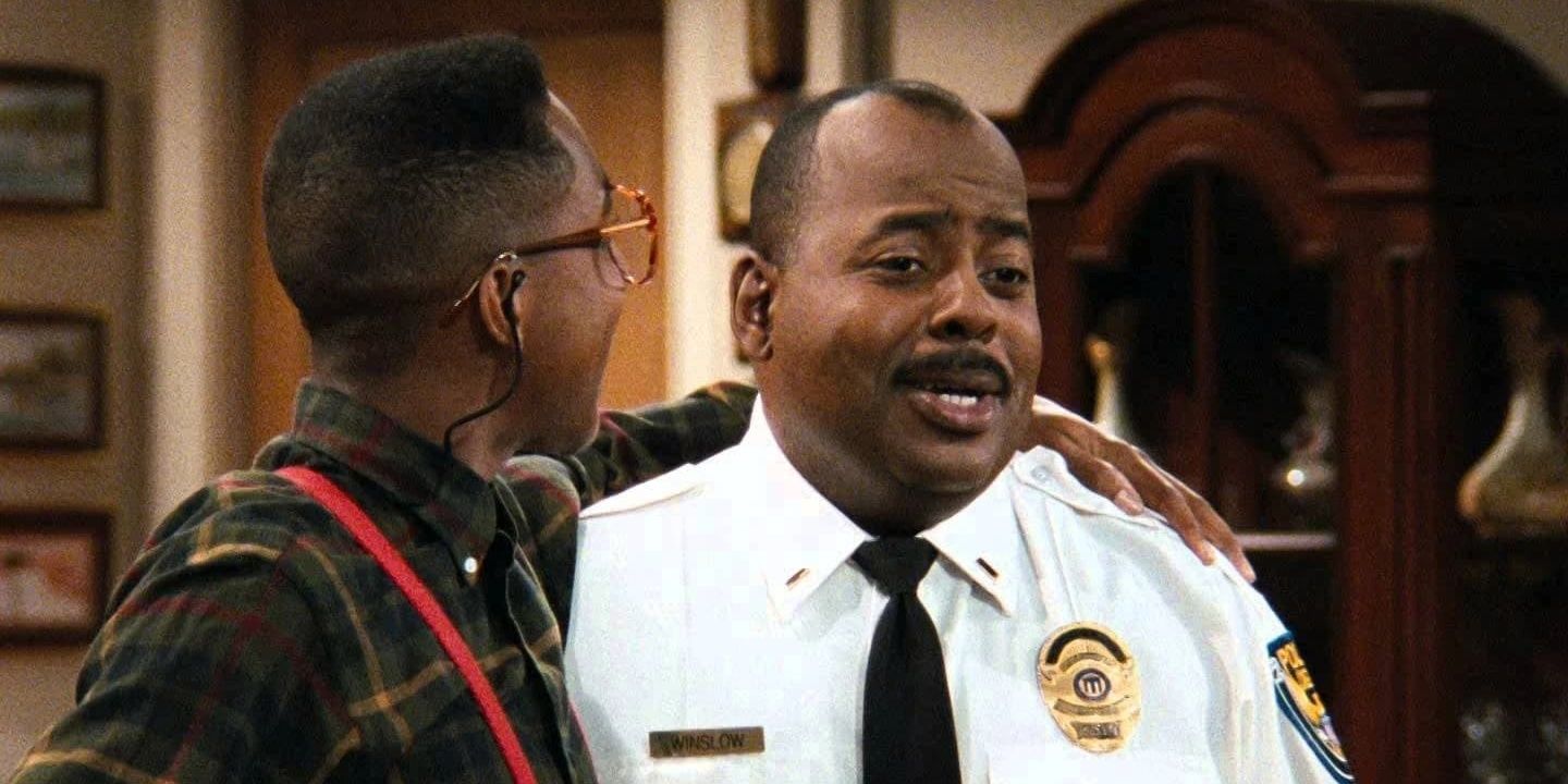 Steve Urkel places his arm around Carl Winslow in Family Matters. 