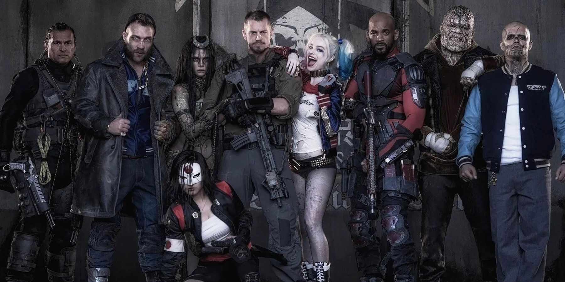 A promotional photo for the 2016 film Suicide Squad, with nine of the team's members standing side by side.