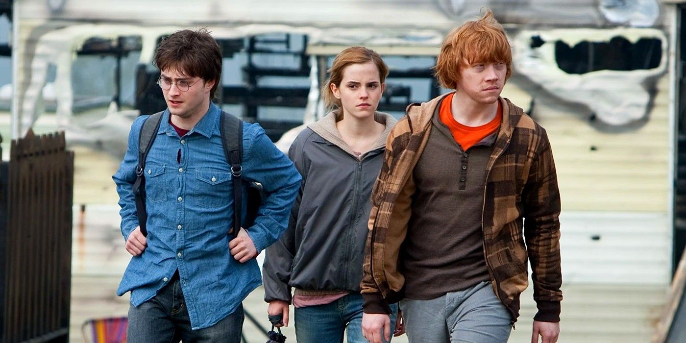The Golden Trio (Harry, Hermione, Ron) walking away from a camper during the Horcrux Hunt in Harry Potter
