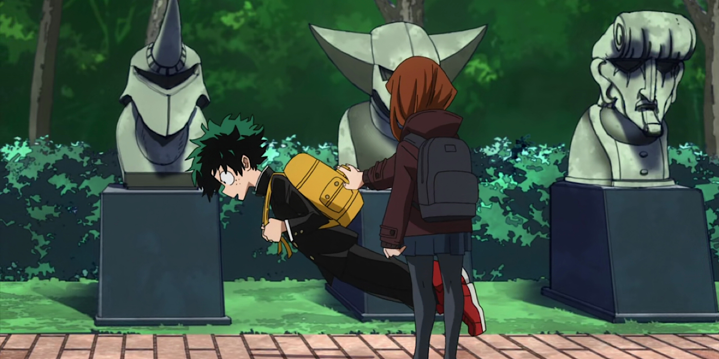 Deku suspended in midair under the effect of Zero Gravity with Uraraka stretching her hand out towards him