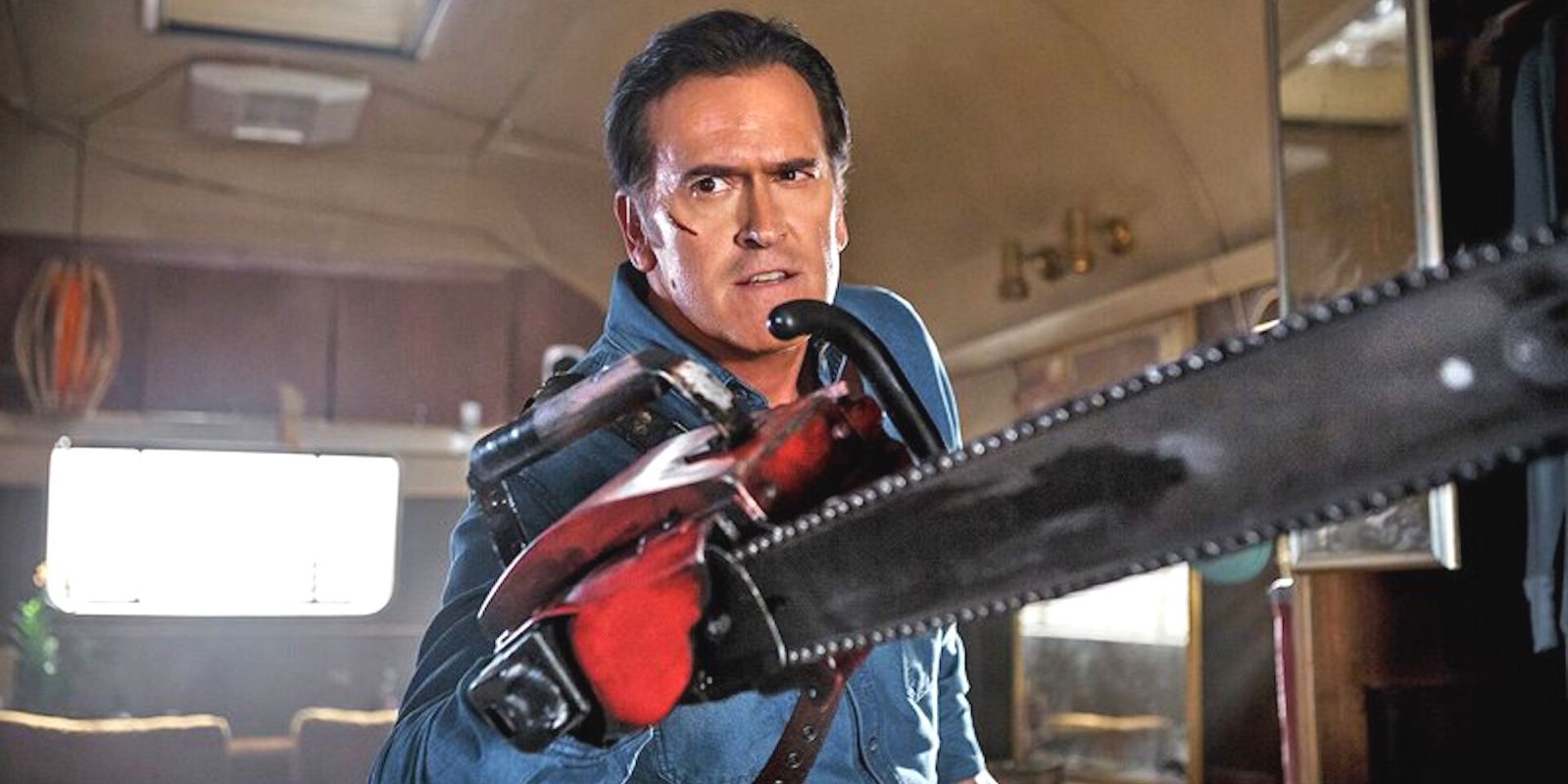 Bruce Campbell in Ash vs. the Evil Dead displaying his chainsaw arm