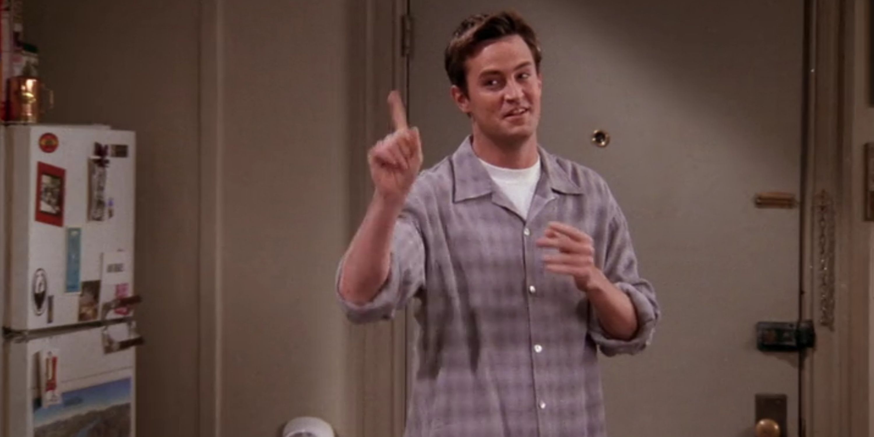 Chandler Bing pointing up in Friends.